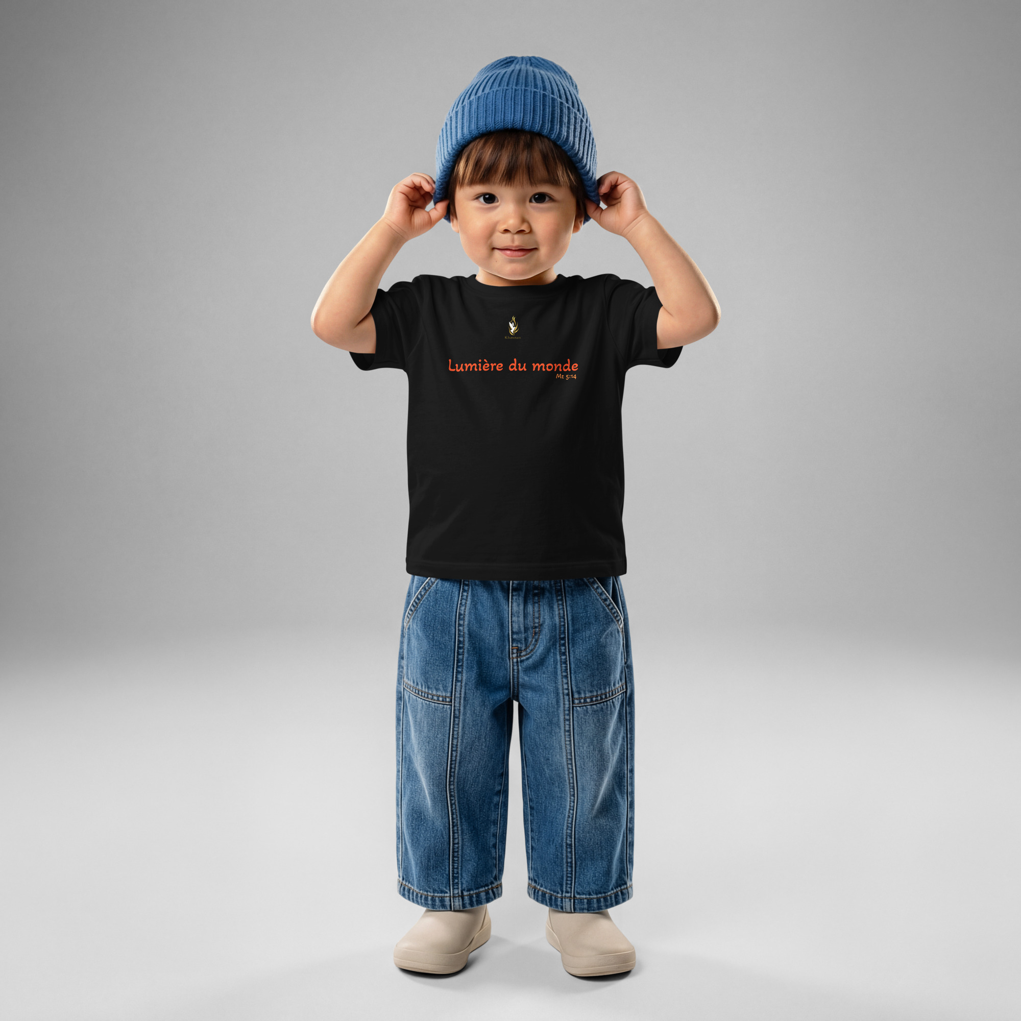 T-shirt bébé KHAWNAN noir, parole « Lumière du monde », vue de face.