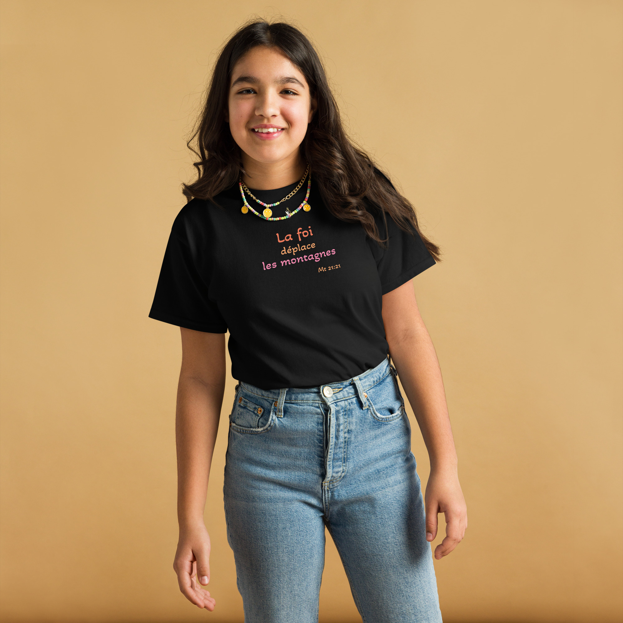 T-shirt classique enfant KHAWNAN noir, parole « La foi déplace les montagnes », vue de face.